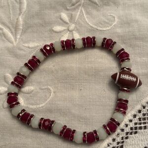 Elegant Red and White Beaded Bracelet with Football Charm